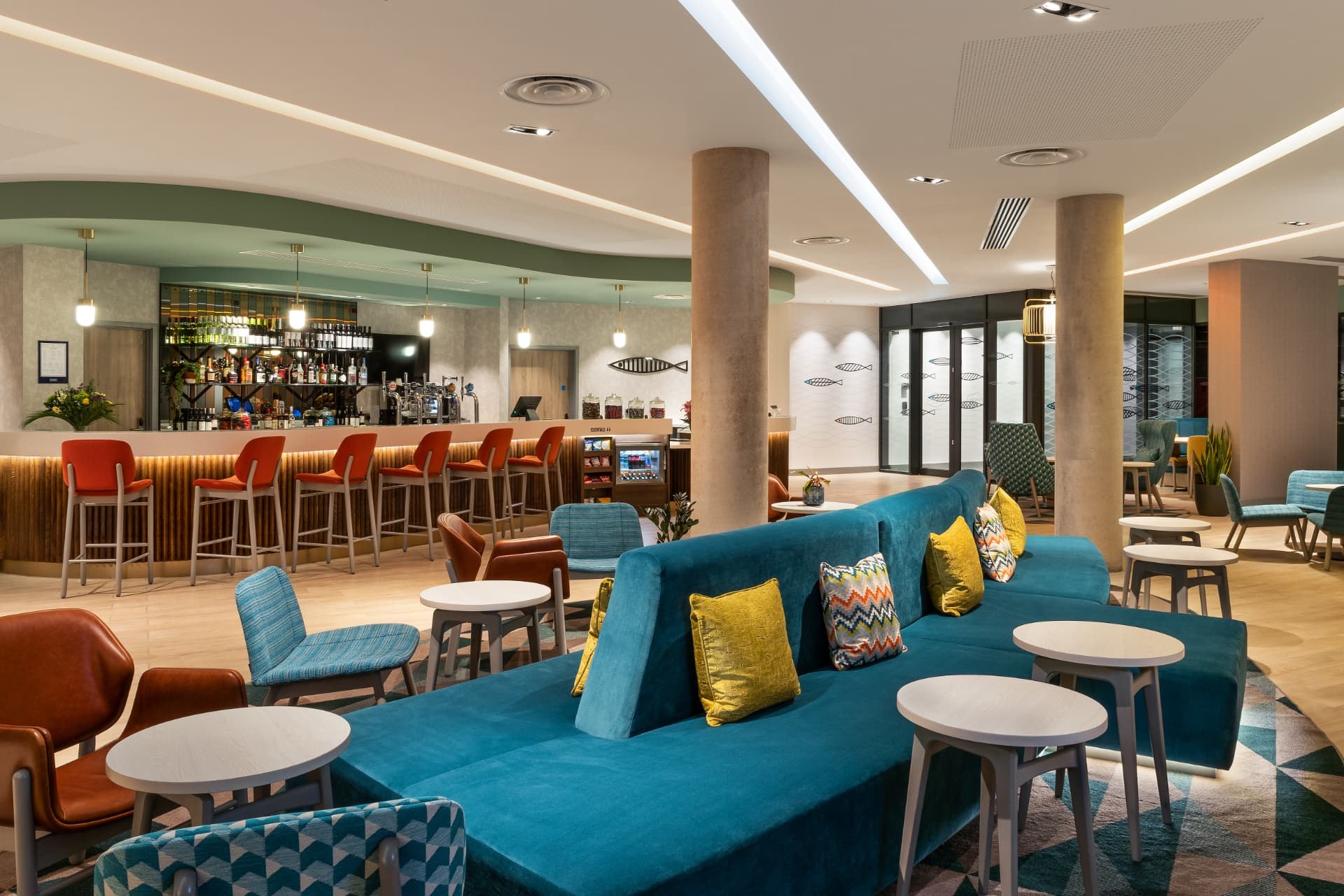 Lobby seating and bar at Hampton by Hilton Torquay
